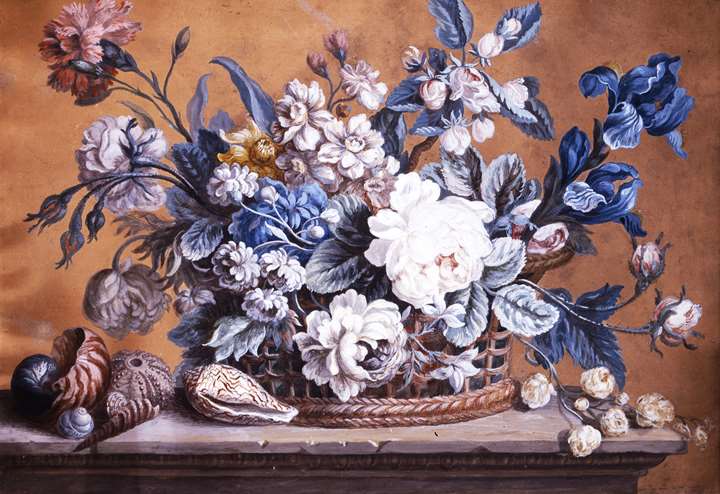 Flowers in wicker baskets with shells – a pair